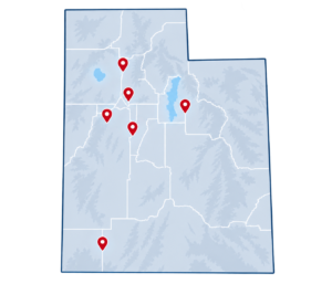 Map of Utah showing The Roofing Contractor's service counties: Salt Lake, Utah, Davis, Weber, Washington, and Summit